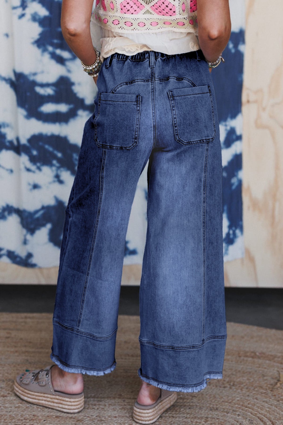 Blue drawstring raw hem jeans