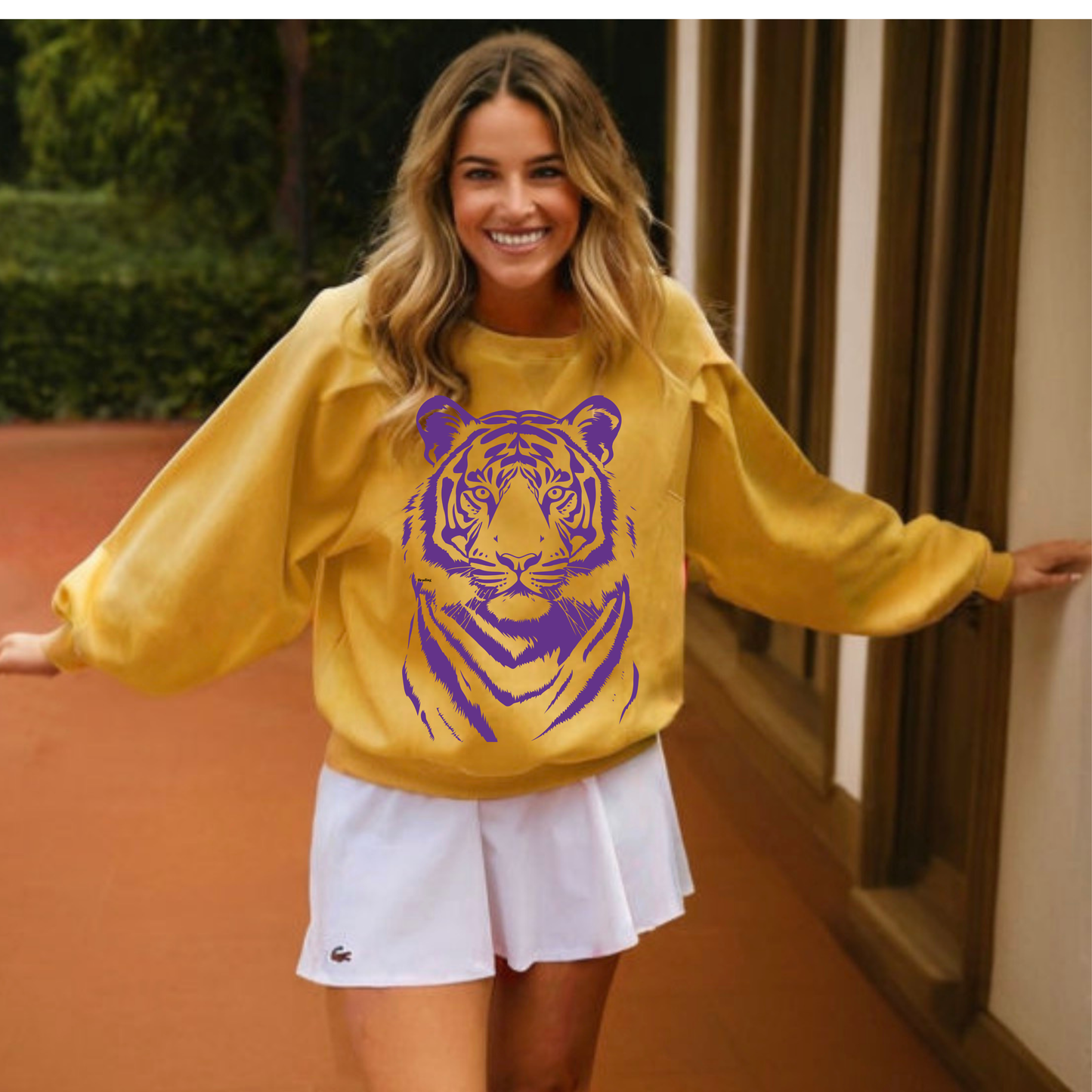 Oversized Mascot, on mustard sweatshirt