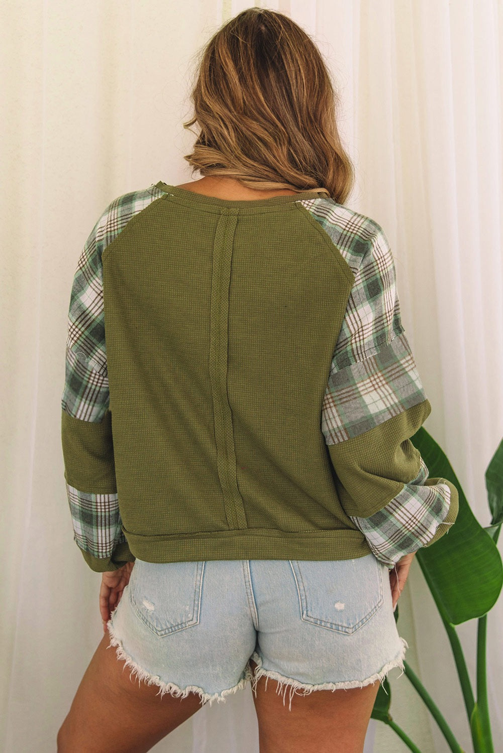 Green Waffle exposed seam bubble sleeve top