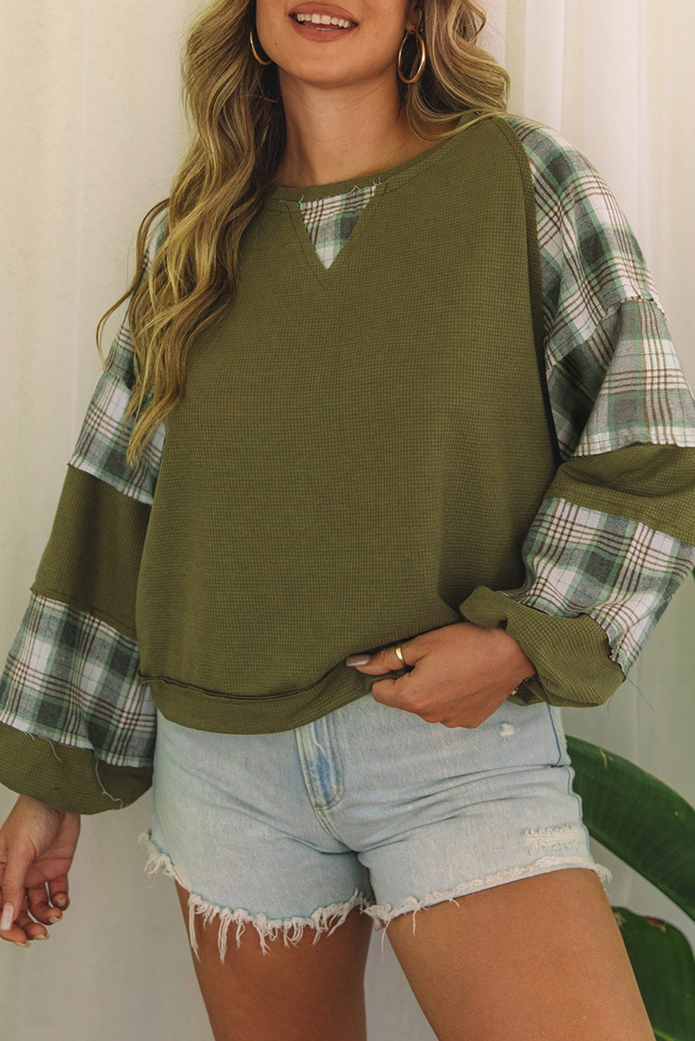 Green Waffle exposed seam bubble sleeve top