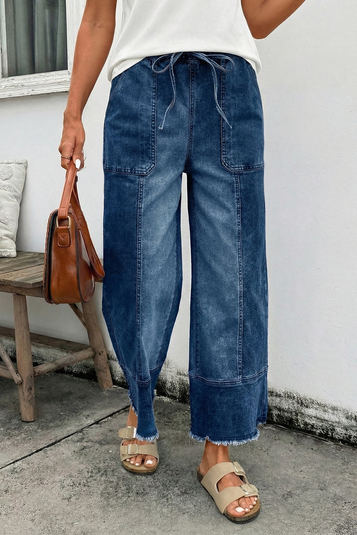 Blue drawstring raw hem jeans