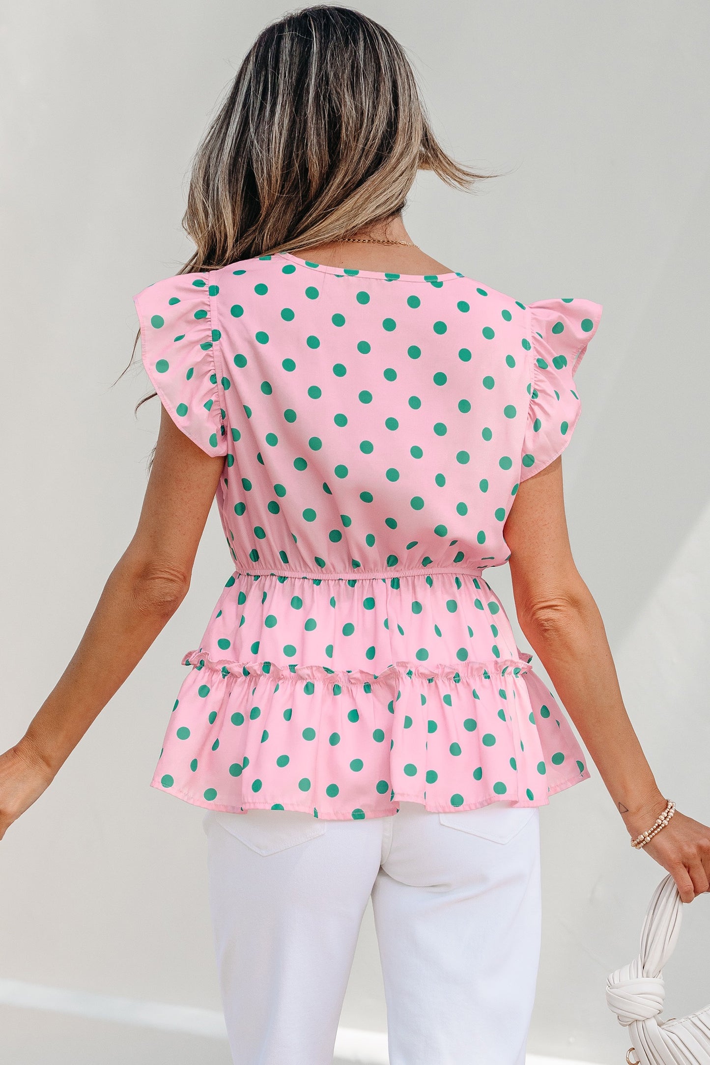 Pink and green polka dot top